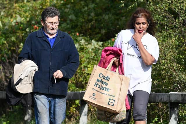 Douglas and Shanti Traynor leave The Shore near Falkirk after their eviction in October 2023