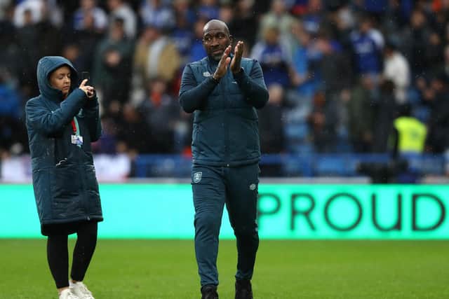 Huddersfield Town manager Darren Moore applauds the fans following the Sky Bet Championship match at John Smith's Stadium, Huddersfield. Picture date: Saturday September 30, 2023. PA Photo. See PA story SOCCER Huddersfield. Photo credit should read: Tim Markland/PA Wire

RESTRICTIONS: EDITORIAL USE ONLY No use with unauthorised audio, video, data, fixture lists, club/league logos or "live" services. Online in-match use limited to 120 images, no video emulation. No use in betting, games or single club/league/player publications.
