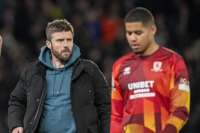 Middlesbrough, head coach Michael Carrick walks off the pitch with keeper Seny Dieng at the end of the match following the 2-2 draw at Hull City. Picture: Tony Johnson.