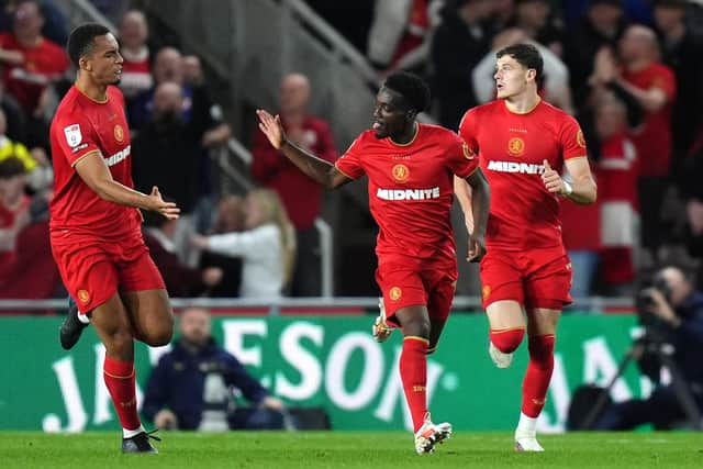 Middlesbrough's Amario Cozier-Duberry (centre) celebrates scoring their side's first goal of the game with team-mates during the Sky Bet Championship match against Millwall at Riverside Stadium, Middlesbrough.