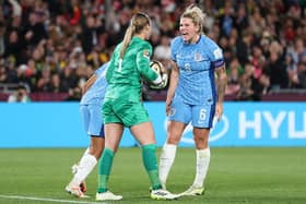 Mary Earps of England is congratulated by Millie Bright after saving the penalty taken by Jennifer Hermoso of Spain (not pictured)  during the FIFA Women's World Cup Australia & New Zealand 2023 Final match between Spain and England at Stadium Australia on August 20, 2023 in Sydney, Australia. (Photo by Catherine Ivill/Getty Images)