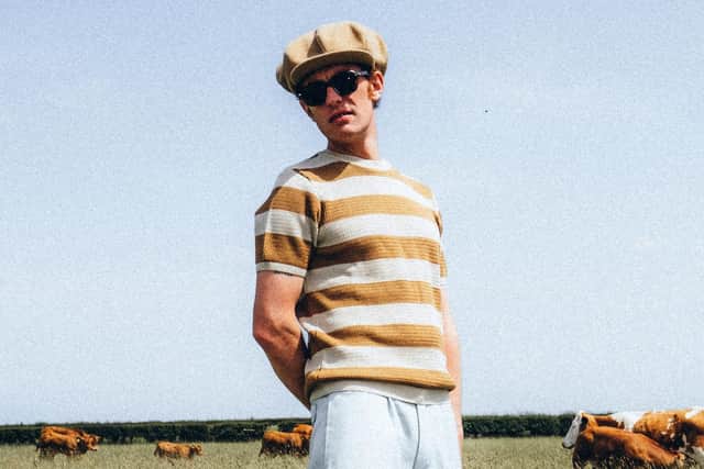 Luke Brennan, frontman of London punk band Muckspreader, wears RAKER Clarke Knitted Tee in Camel and Black, £60. Photographed by Tom Atkin on the Yorkshire Wolds.