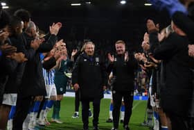 Huddersfield Town players give  Neil Warnock and Ronnie Jepson a guard of honor at the end. (Picture: Jonathan Gawthorpe)