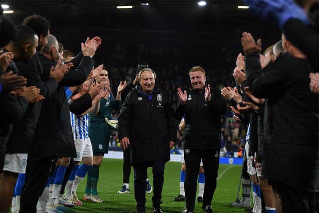 Huddersfield Town players give  Neil Warnock and Ronnie Jepson a guard of honor at the end. (Picture: Jonathan Gawthorpe)
