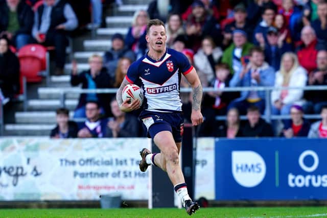 Tom Johnstone races clear to score his second try. (Photo: Martin Rickett/PA Wire)