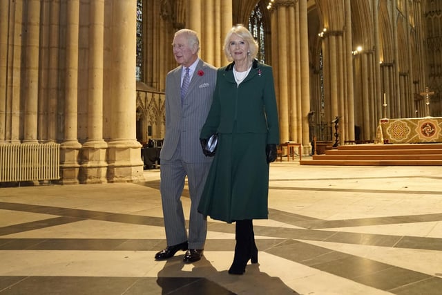 King Charles III and the Queen Consort during a visit to York Minster to attend a short service for the unveiling of a statue of Queen Elizabeth II, and meet people from the Cathedral and the City of York. Picture date: Wednesday November 9, 2022.