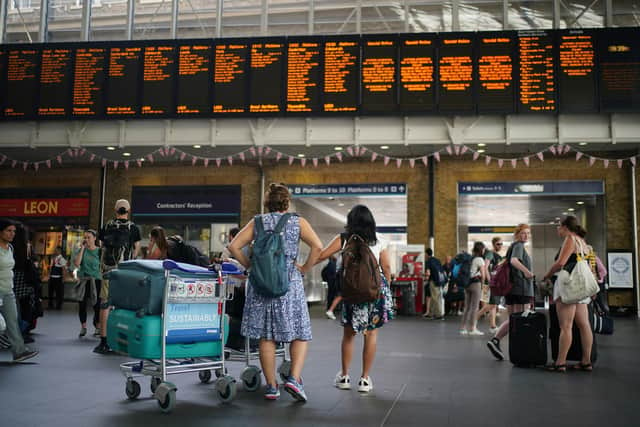 Passengers at King's Cross station in London following train cancellations in 2022. PIC: PA