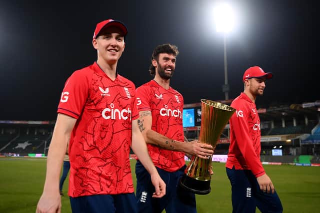 World Cup contenders Harry Brook of England, Reece Topley of England and Will Jacks of England celebrates with the series trophy after winning the 7th IT20 match between Pakistan and England at Gaddafi Stadium. (Picture: Alex Davidson/Getty Images)