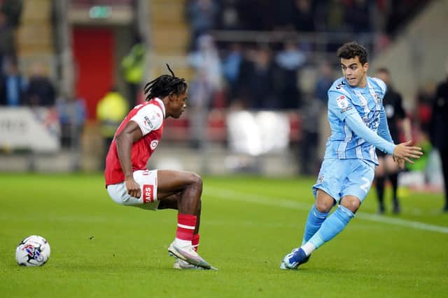 NO OBSTACLE: Rotherham United's Dexter Lembikisa is unable to cut out Yasin Ayari's pass