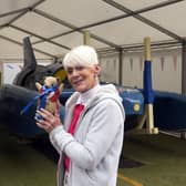 Gina Campbell with the restored Bluebird K7 before it takes to the water for the first time in more than 50 years off the Isle of Bute on the west coast of Scotland.