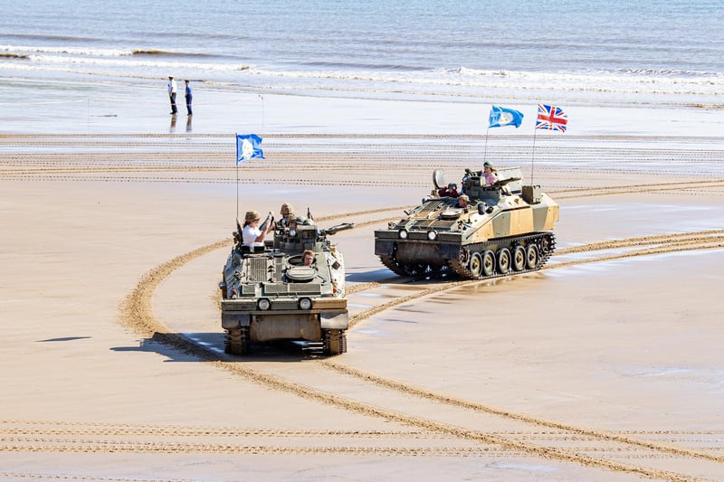 Tanks on the beech offering rides to visitors at the Steampunk Weekend