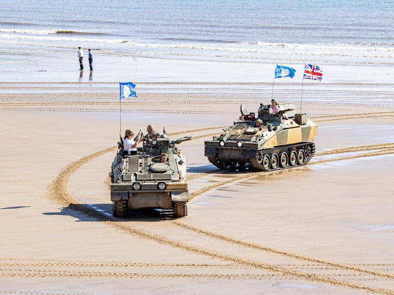 Tanks on the beech offering rides to visitors at the Steampunk Weekend
