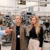 HETA business development executive Mick Wigglesworth with Holly Barker (centre) and Zoe Pell of EFAB in the mechanical engineering workshop.(Photo supplied by HETA)