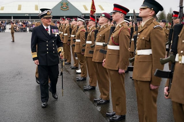 Vice Admiral Phili Hally CB MBE, Chief of Defence People at the Ministry of Defence inspects junior soldiers during their graduation parade.