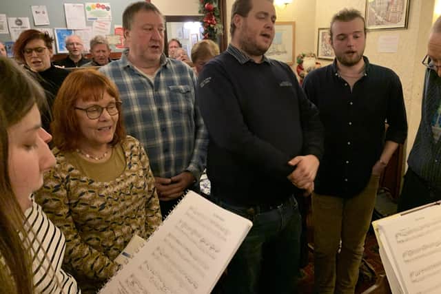 A carol sing at the Royal Hotel, Dungworth. Photo: Professor Ian Russell