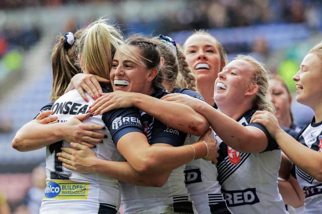 England’s Fran Goldthorp celebrates with team-mates after scoring a try. (Picture: Alex Whitehead/SWpix.com)