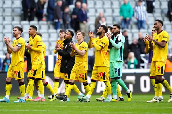 GOING DOWN: Sheffield United players applaud the fans after the final whistle in the Premier League match at St. James' Park, Newcastle upon Tyne. Sheffield United have been relegated from the Premier League after losing 5-1 at Newcastle. Picture: Owen Humphreys/PA