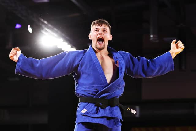 Name in lights: Penistone's Lachlan Moorhead celebrates defeating Francois Gauthier Drapeau of Canada to win judo gold in the 81kg division at the Birmingham 2022 Commonwealth Games (Picture: Mark Kolbe/Getty Images)