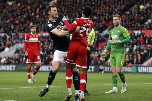 Tempers flare between Millwall's Jake Cooper and Middlesbrough's Chuba Akpom during the Sky Bet Championship match at the Riverside Stadium, Middlesbrough. Picture: Will Matthews/PA