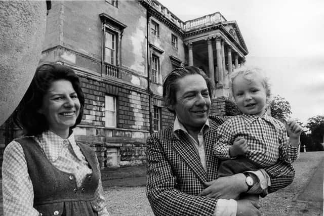 Lord Scarborough with his wife, Elizabeth, and two year old son, Richard, Viscount Lumley, in the grounds of Sandbeck Park in July 1975