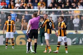 CAUTION: Oli McBurnie gets his fourth booking of the fledgling Premier League season against Everton last week (Image: Stu Forster/Getty Images)