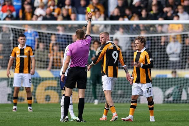 CAUTION: Oli McBurnie gets his fourth booking of the fledgling Premier League season against Everton last week (Image: Stu Forster/Getty Images)