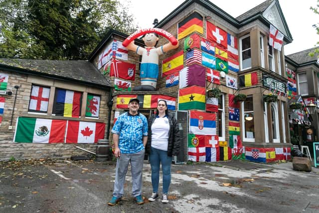 Landlords Helena, 42, and Mark Bennett, 48, have decorated their pub, The Big Tree pub in Sheffield, with flags from around the world ahead of the World Cup
