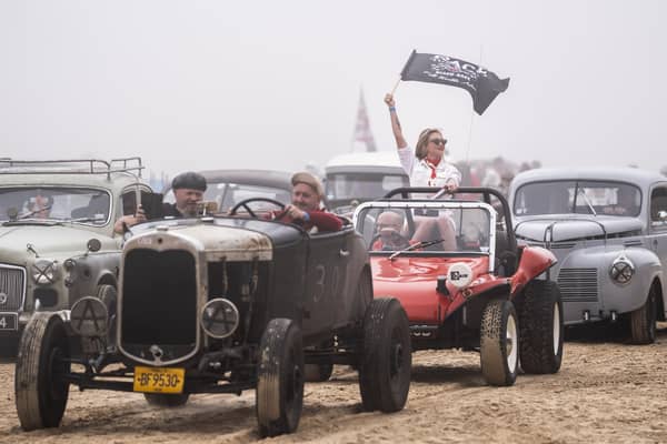 Vintage vehicles during  Race The Waves 2024 on Bridlington's South beach in Yorkshire. The unique event within the UK motoring calendar will see classic cars and bikes race the waves along Bridlington's South beach in pairs from a flagged start.Danny Lawson/PA Wire