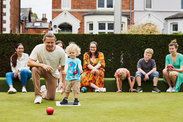 Branching out: A young family tries a new sport at the Bowls' Big Weekend which returns this weekend with 24 clubs inviting people to come and have a go.