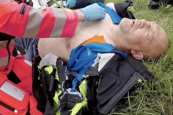 Motorcyclist, Damian Galloway, being treated by YAA crew. (Pic credit: Yorkshire Air Ambulance)