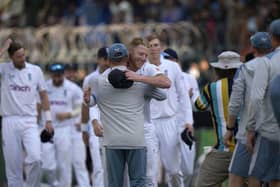 England's skipper Ben Stokes, center, is congratulated by team's officials after winning the second test cricket match against Pakistan, in Multan, Pakistan. PIC: AP Photo/Anjum Naveed