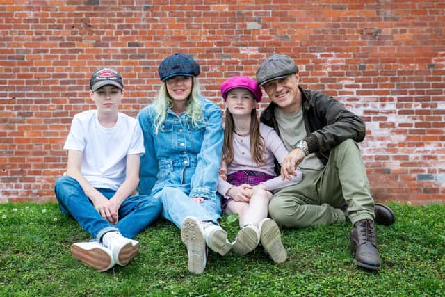 Richard Bradley and Cheryl Rhodes model Whippet Caps with their children, Elijah, 14, and Tallulah, 11. Photos by Laura Mate Photography on location at Sunny Bank Mills in Farsley, Leeds.