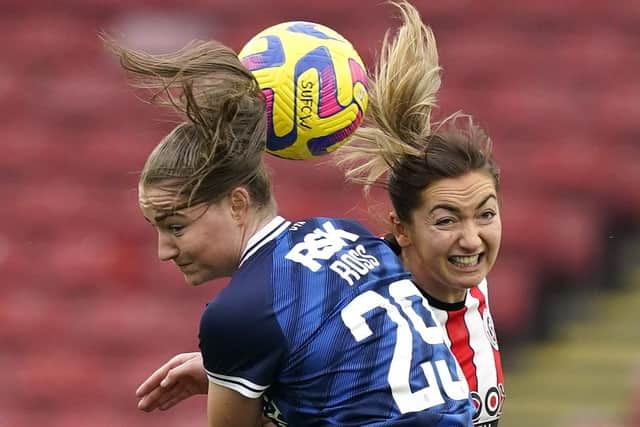 Maddy Cusack of Sheffield Utd tussles with Mia Ross of Charlton during the The FA Women's Championship match at Bramall Lane, Sheffield. (Picture: Andrew Yates / Sportimage)