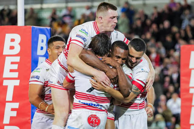 Leigh’s Joe Mellor is congratulated on their try by team-mates after scoring in the Betfred Championship Grand Final against Batley Bulldogs (Picture: Alex Whitehead/SWPix.com)