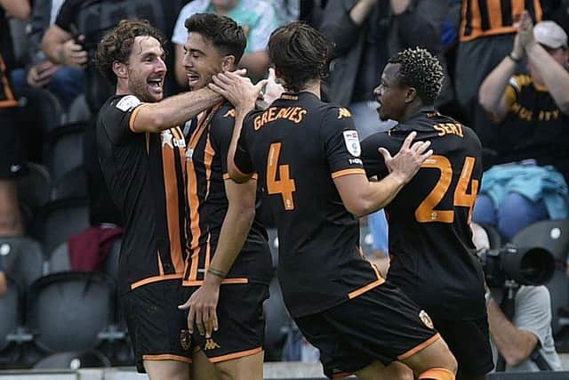 Hull City's hat-trick hero Ozan Tufan celebrates one of his goals in the 4-2 success over Yorkshire rivals Sheffield Wednesday. Picture: Steve Ellis