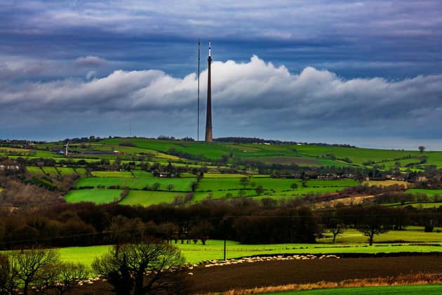 The Emley Moor transmitter (known as Arqiva Tower) is the tallest free standing structure in the UK at 328m -  1084 ft. At the moment there's a temporary mast standing around 317m (1,040ft) tall this was erected in 2017 whilst vital repairs are carried out to the main mast.
Picture By Yorkshire Post Photographer,  James Hardisty.
