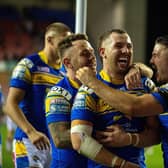 Cameron Smith, centre, captained Leeds Rhinos to victory over Wigan Warriors last year. (Picture by Bruce Rollinson)