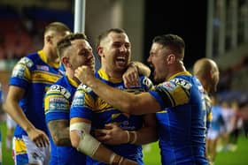 Cameron Smith, centre, captained Leeds Rhinos to victory over Wigan Warriors last year. (Picture by Bruce Rollinson)