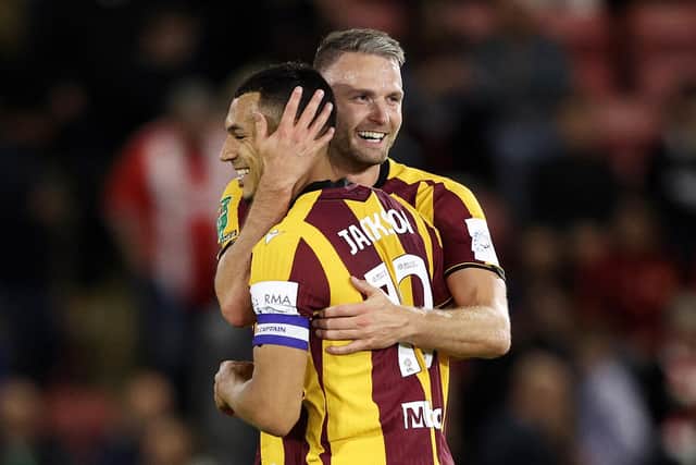 Nick Powell of Bradford City celebrates scoring his team’s third goal with Kayden Jackson during the Carabao Cup third round match between Leyton Orient and Bradford City at BetWright Stadium (Picture: James Fearn/Getty Images)