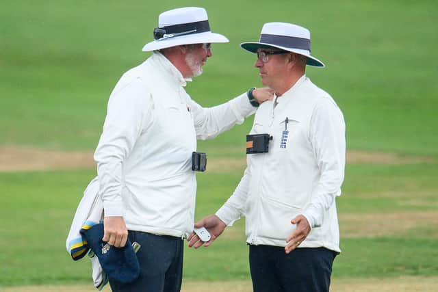 Umpires Ian Blackwell, left, and Graham Lloyd called off play just after midday. Picture by Allan McKenzie/SWpix.com