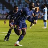 JUNIOR PEDIGREE: Djeidi Gassama celebrates scoring for Paris Saint-Germain at Manchester City in the 2021-22 UEFA Youth League