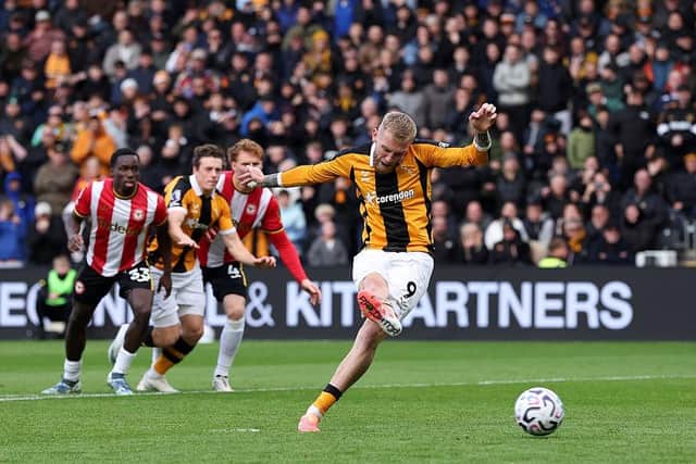 BACK IN THE GROOVE: Oli McBurnie scores from the penalty spot for Hull City against Brentford (Image: Alex Livesey/Getty Images)