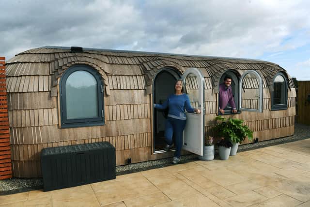 Sally with son Sam and one of the Iglu glamping pods.