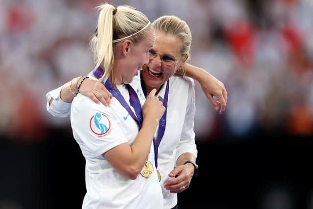 Beth Mead of England celebrates with Sarina Wiegman, Manager of England following the UEFA Women's Euro 2022 final win over Germany at Wembley Stadium on July 31 (Picture: Naomi Baker/Getty Images)