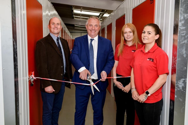 Official opening of Worksop Self Storage, Shireoaks.  MP John Mann cuts the ribbon watched by director Richard Stewart, sales assistant Lauren Williams and group general manager, Sophie Trueman.