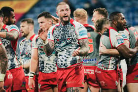 Leigh’s Zak Hardaker and his team-mates celebrate another try against Huddersfield Giants (Picture: Alex Whitehead/SWpix.com)