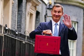 Chancellor Jeremy Hunt leaves 11 Downing Street, London, with his ministerial box before, before delivering his Budget last year. PIC: Victoria Jones/PA Wire