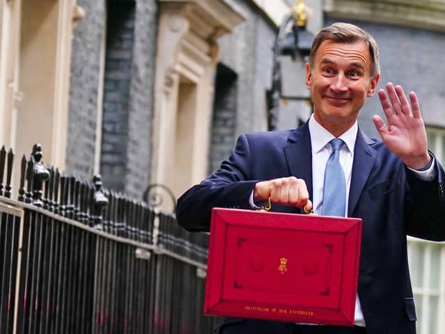 Chancellor Jeremy Hunt leaves 11 Downing Street, London, with his ministerial box before, before delivering his Budget last year. PIC: Victoria Jones/PA Wire