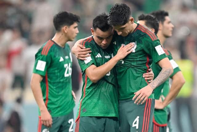 Mexico's midfielder #08 Carlos Rodriguez (L) and Mexico's midfielder #04 Edson Alvarez (R) react after the Qatar 2022 World Cup Group C football match between Saudi Arabia and Mexico (Picture: ALFREDO ESTRELLA/AFP via Getty Images)