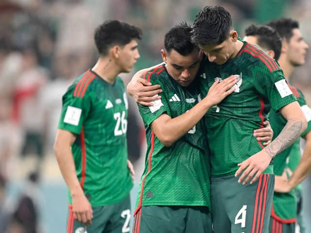 Mexico's midfielder #08 Carlos Rodriguez (L) and Mexico's midfielder #04 Edson Alvarez (R) react after the Qatar 2022 World Cup Group C football match between Saudi Arabia and Mexico (Picture: ALFREDO ESTRELLA/AFP via Getty Images)